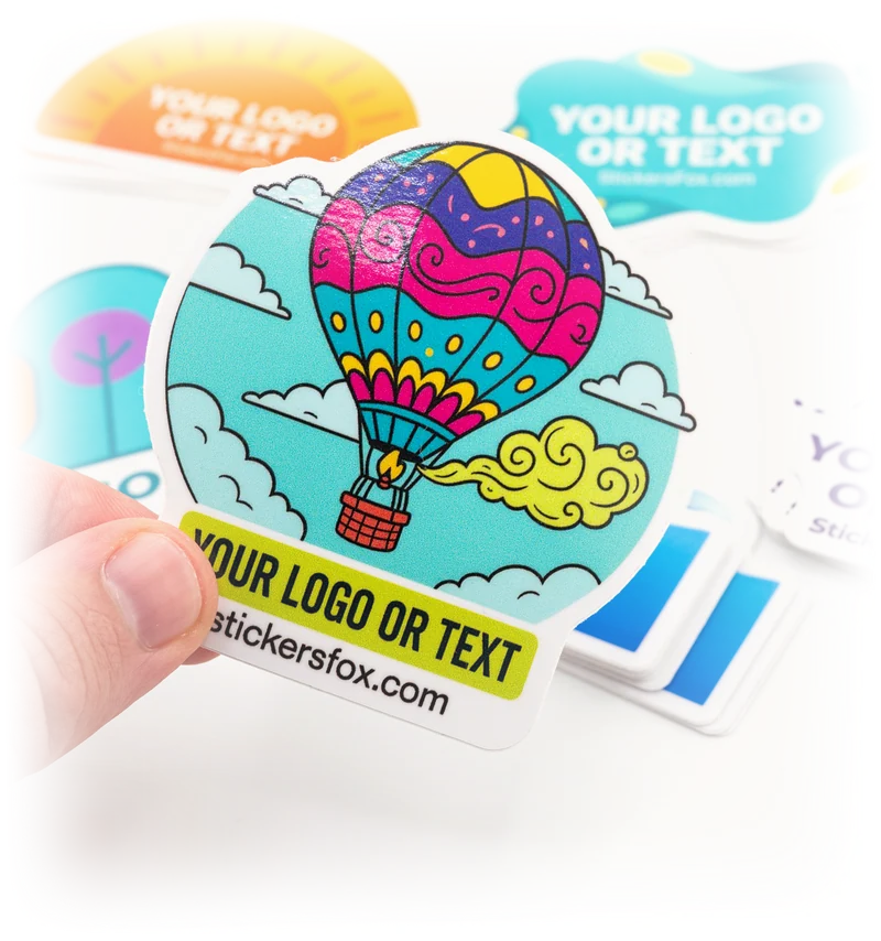 Custom die-cut vinyl sticker held in hand