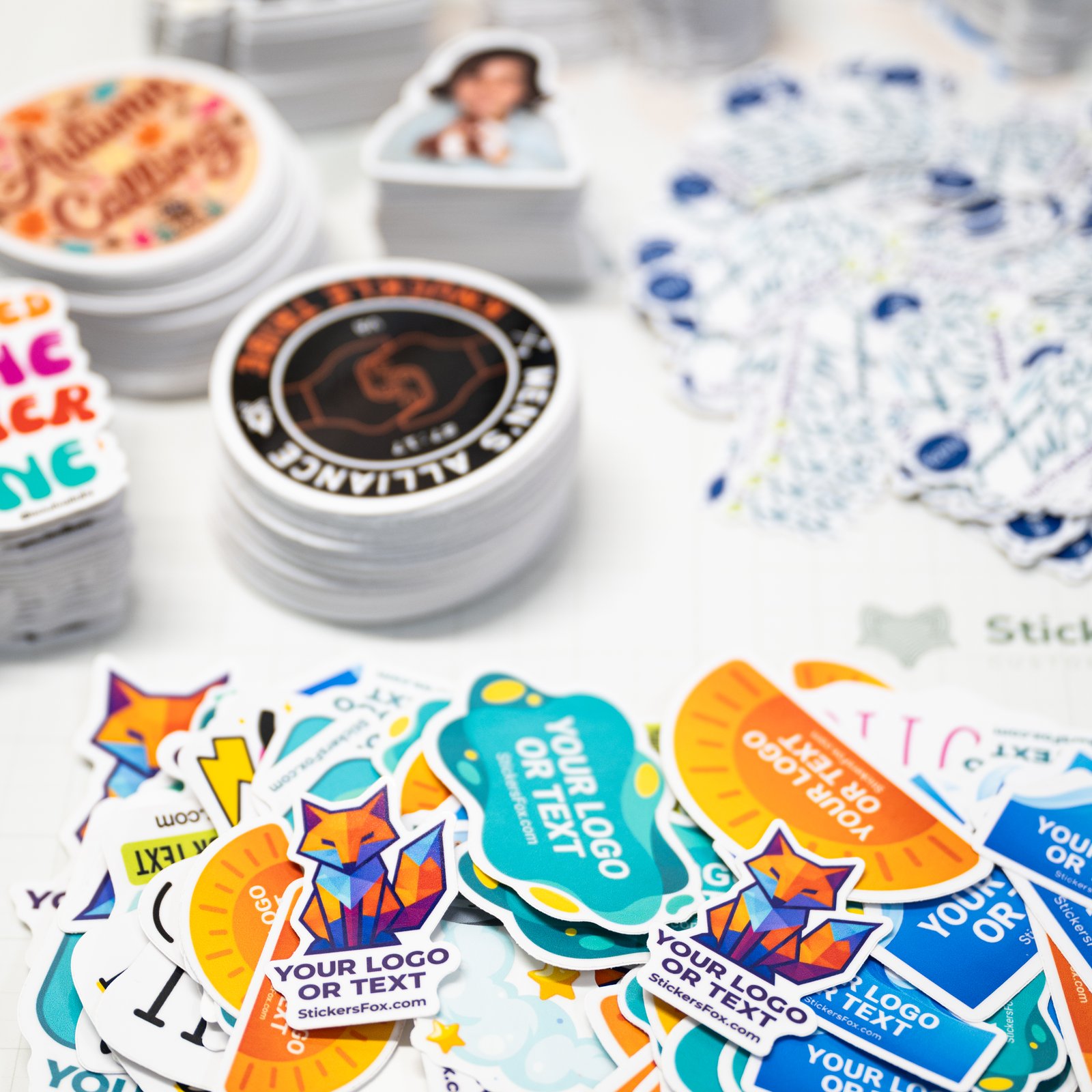 Wholesale bulk custom stickers stacked on a table